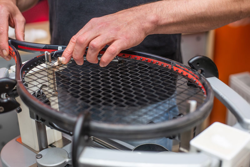 le cordage le moteur de la raquette